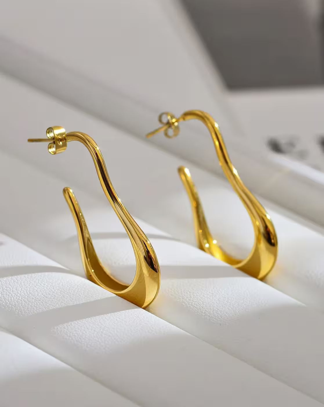 Bold Curve Gold Earrings